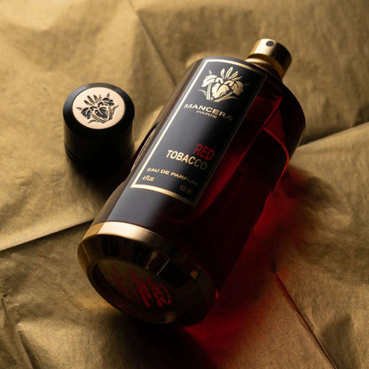 red tobacco sample EDP - Travel Spray - Travel Spray setting the stage for an unforgettable middle that features enchanting jasmine and rich patchouli Mancera Red Tobacco Eau de